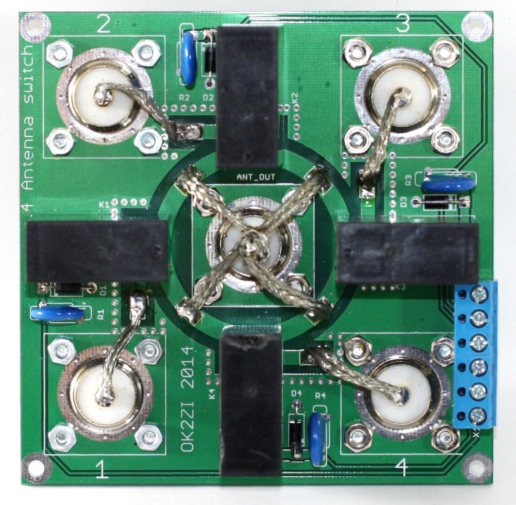 The PCB showing the relays and wiring of the S)-239 sockets. The blue connector block on the lower right side of the board is connected to the 5 Pin DIN socket which controls the relays.
